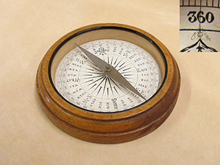 Late 19th century Francis Barker oak cased desktop compass with Trademark London logo